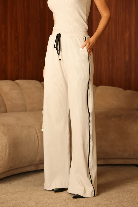 Calça Canelada Bege Frysaide Com Vivo Contrastante